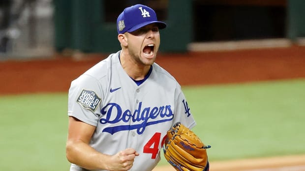 Blake Treinen celebrates after a strikeout.